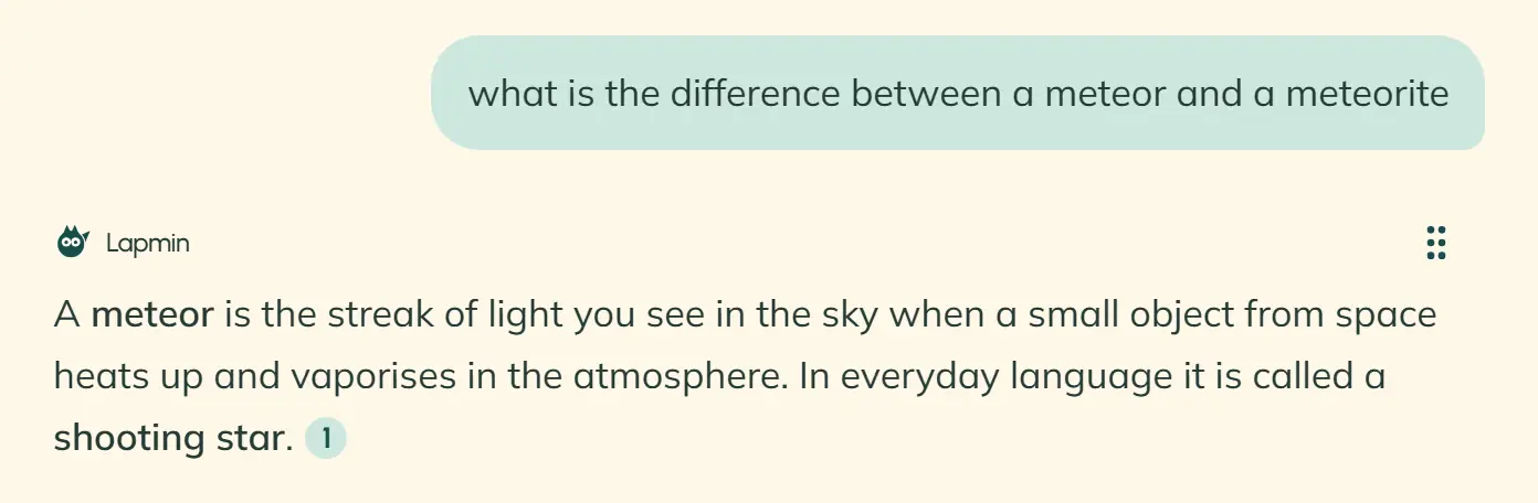 A student’s question about the difference between a meteor and a meteorite, followed by the start of Lapmin’s answer. A drag handle appears at the right end of the answer’s top row, beside Lapmin’s name.